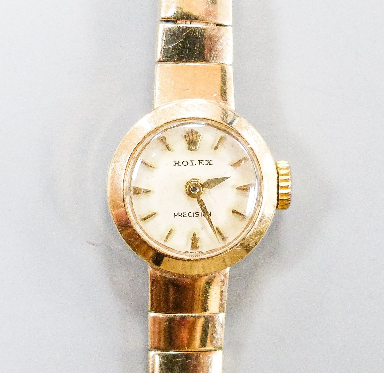 A lady's 9ct gold Rolex manual wind wrist watch on 9ct gold strap, case diameter 15mm